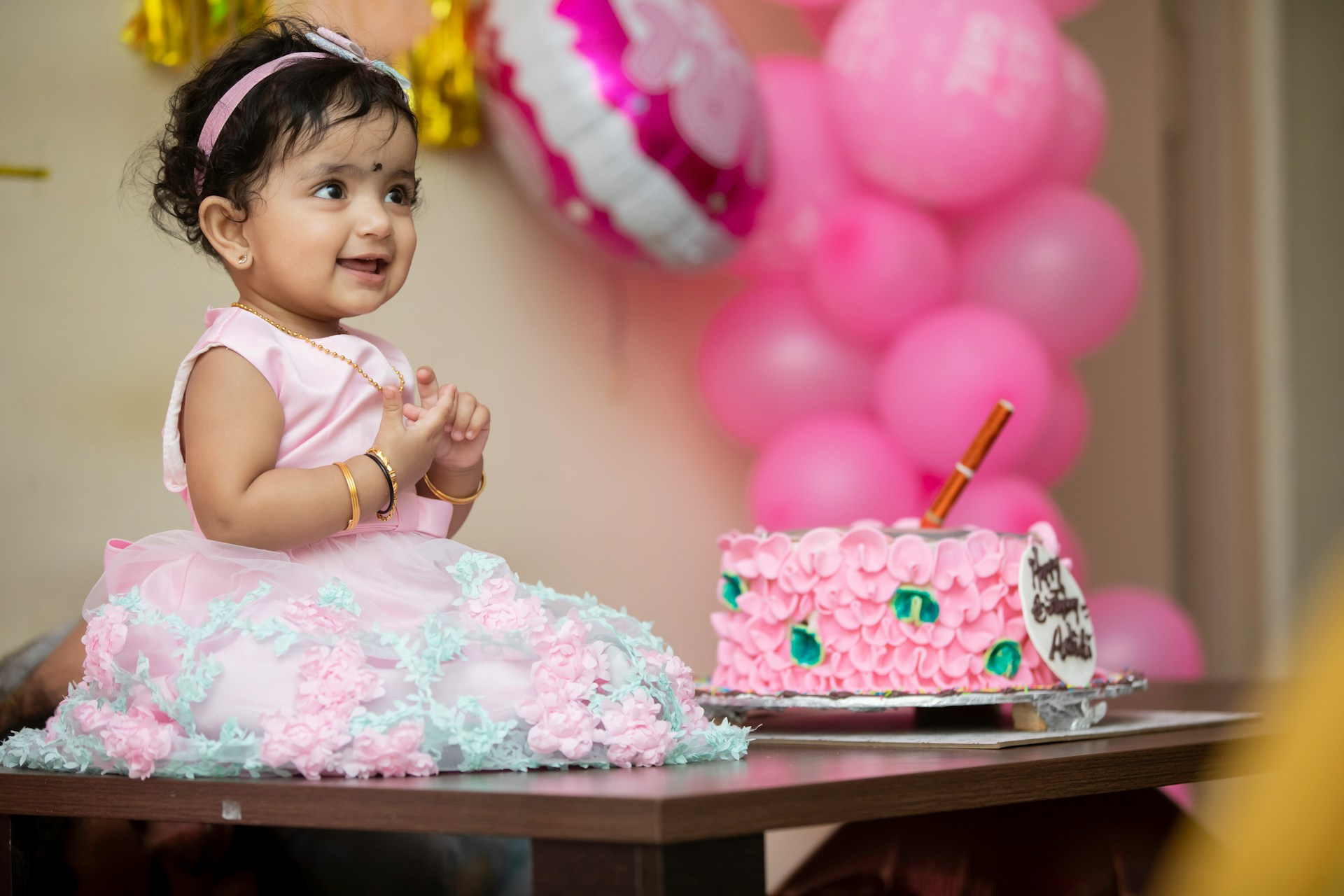 A young girl having a birthday party